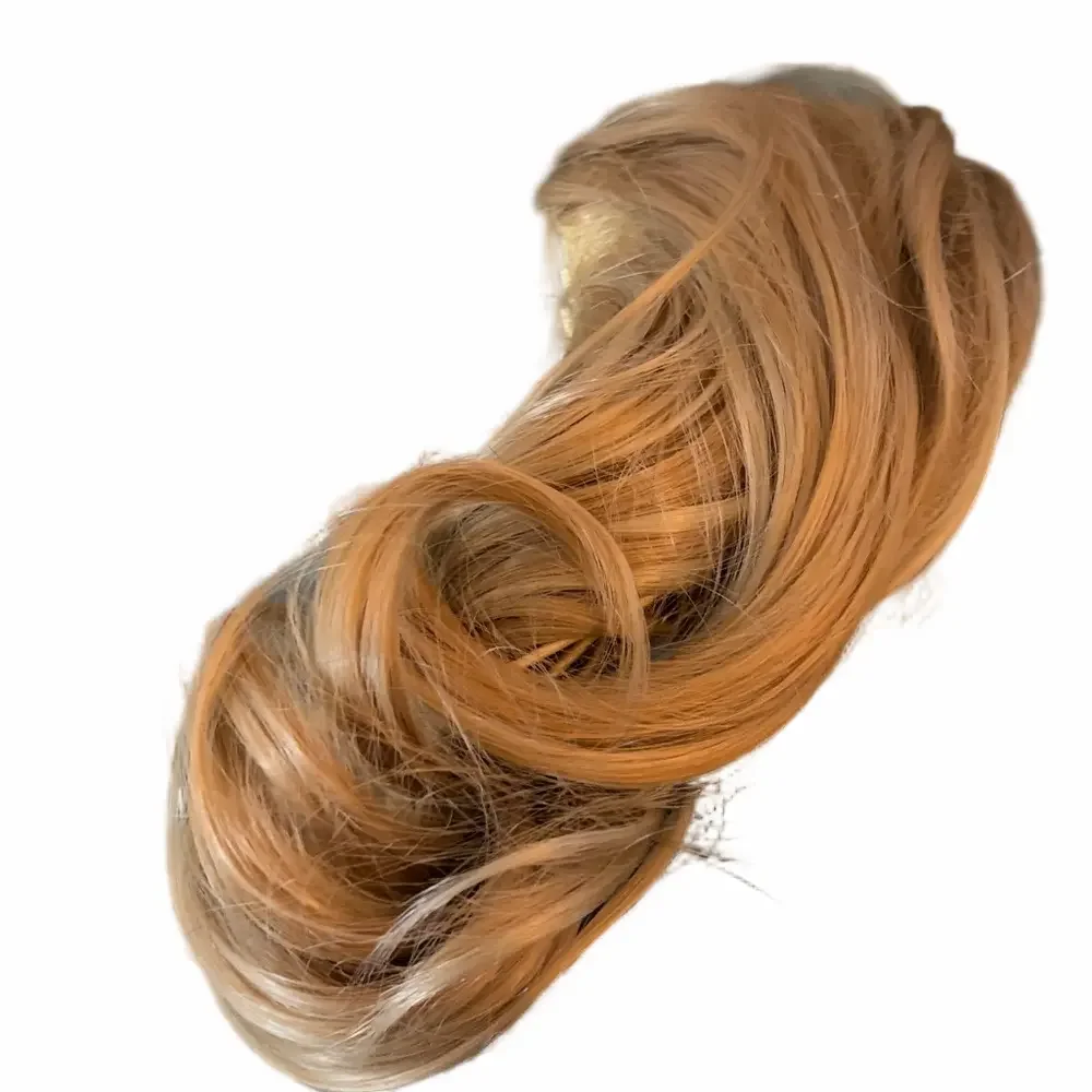light brown clip - in hair extension 10”